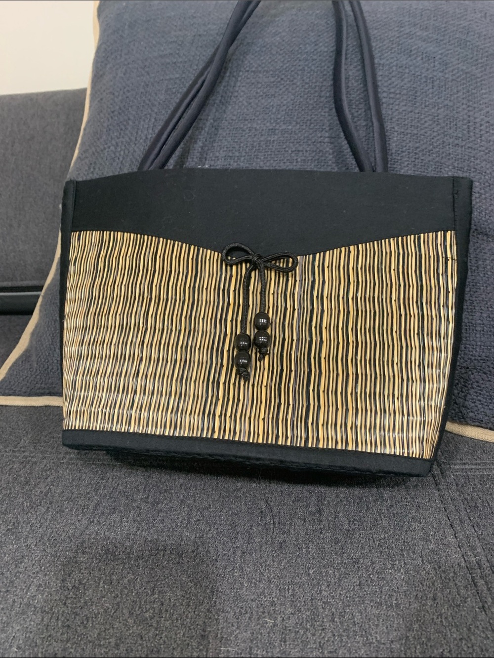 Black and Natural Straw Tote with Decorative Bead Tie